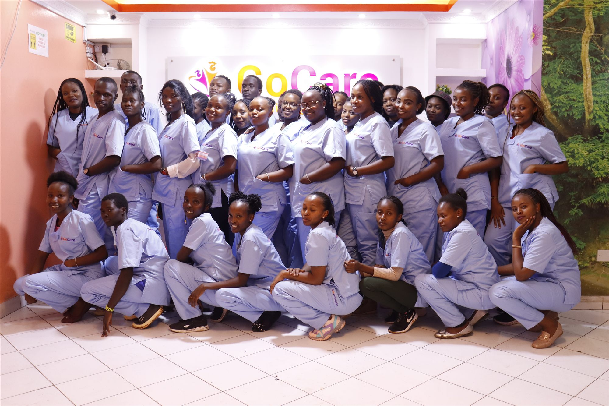 GoCare students and graduates in branded scrubs